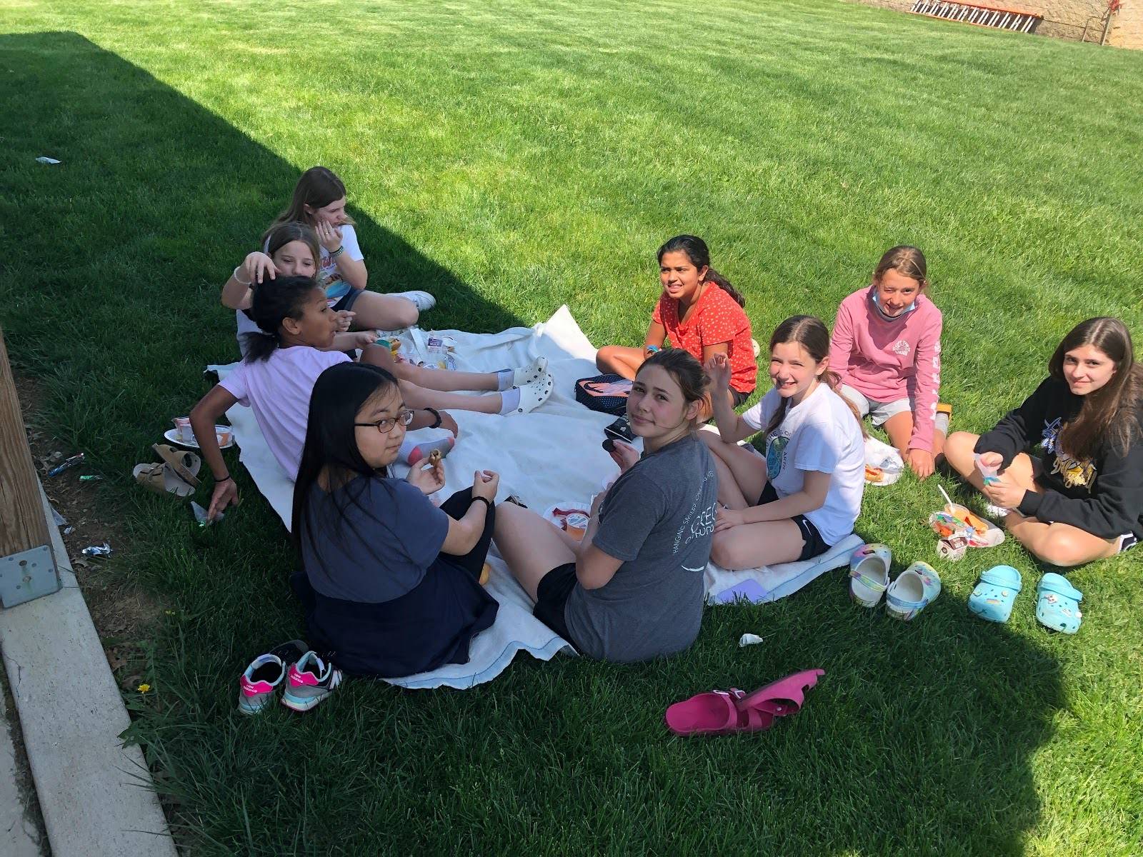 students eating outside