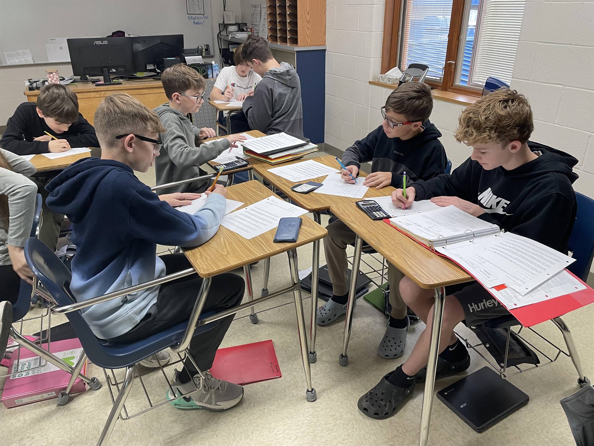 students working on math problems