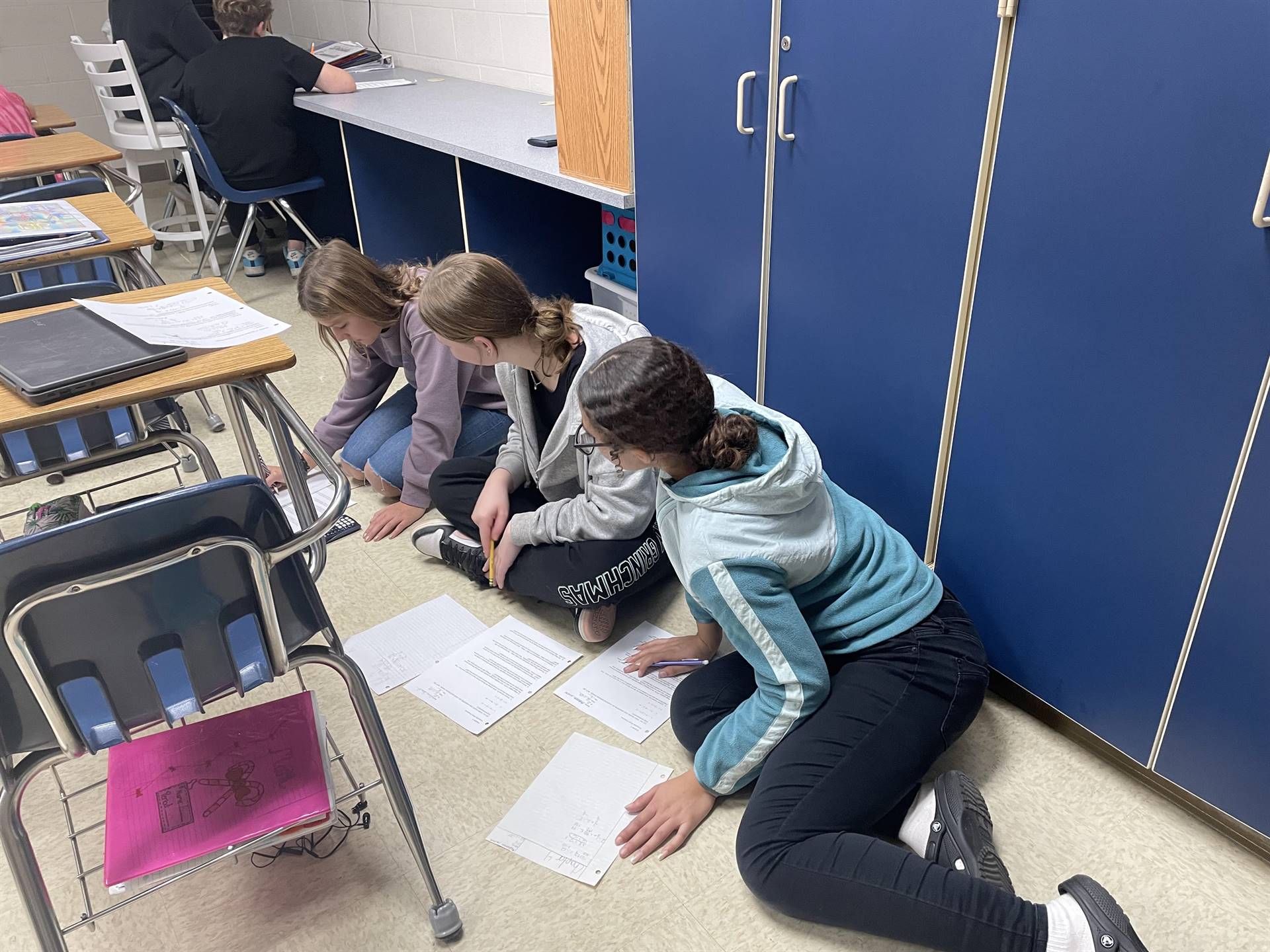 students working on math problems