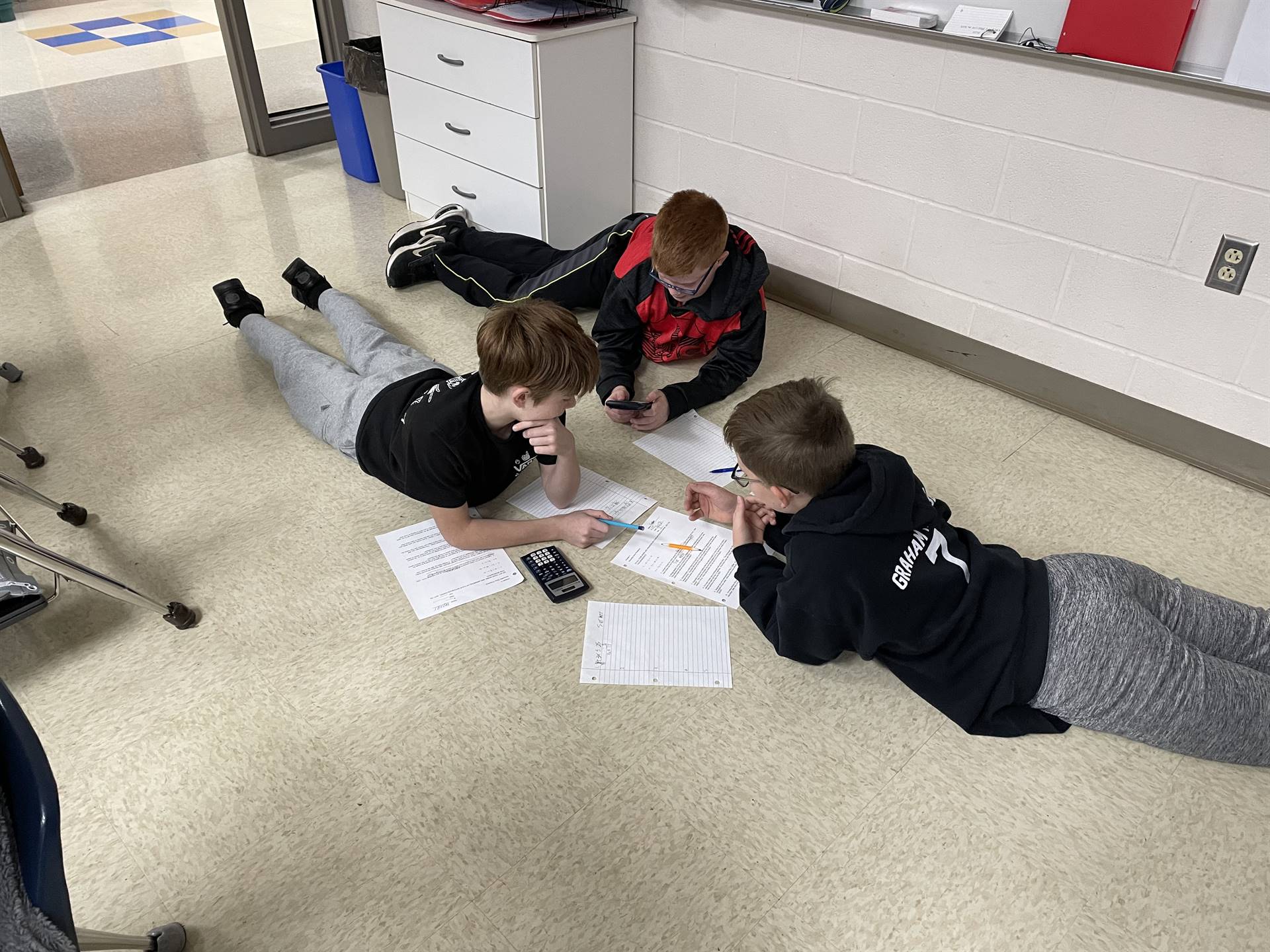 students working on math problems